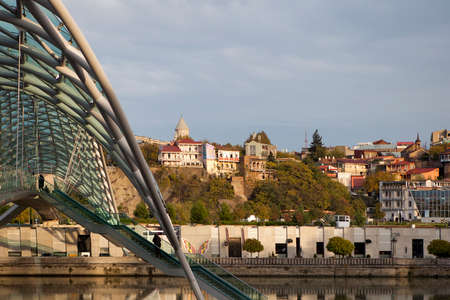 TBILISI, GEORGIA, 16 AUGUST, 2016: The embankment of Kura River near the Rike Park and the President Palace above itのeditorial素材