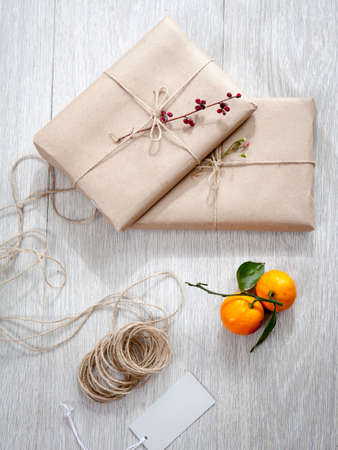 Various items for gift wrapping are on the table. Gifts already packedの写真素材
