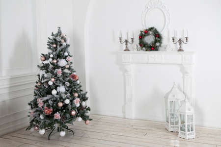 Christmas tree studio shot with lot of silver and red decorationsの写真素材