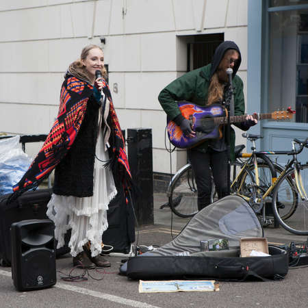 London, England, UK - August 4, 2016: Performers busking at Broadway market