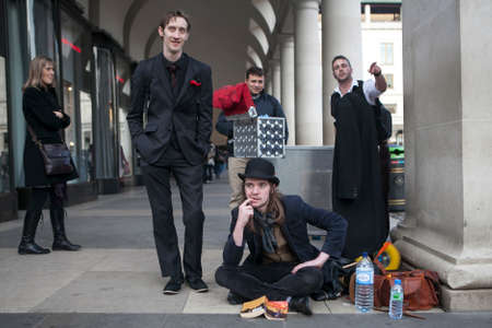LONDON, ENGLAND - JULY 12, 2016 magicians waiting for their turn to perform at Magic corner of...