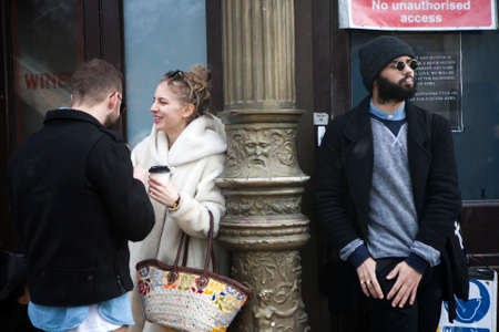 LONDON, UK - APRIL 22, 2016: Crowd scene Covent Garden, People waiting near tube.のeditorial素材