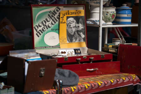 LONDON, ENGLAND - March 30, 2017 Posters on the table and other things on the Spitalfields market...