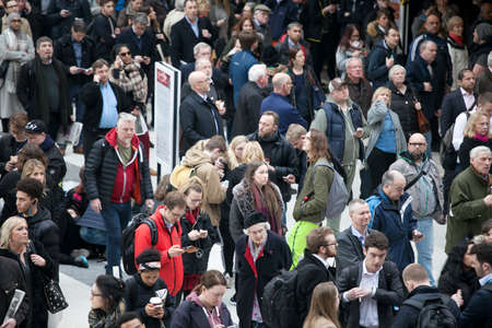 LONDON, ENGLAND - March 12, 2017 People at Liverpool Street station. Opened in 1874 it is third busiest and one of the main railway stations in UK, with connection to London Undergroundのeditorial素材