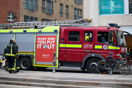 LONDON, ENGLAND - March 12, 2017 Emergency services Firefighters from the London Fire Brigade...