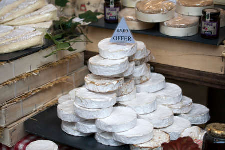 LONDON, UK - APRIL 22, 2017: Normandy Camembert and Couer de Neufchatel cheeses for saleのeditorial素材