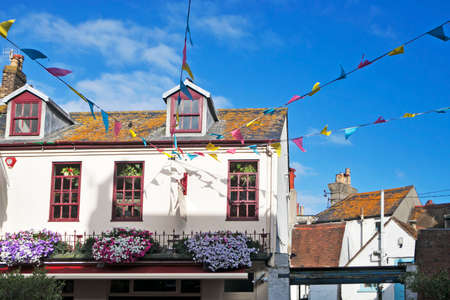 BRIGHTON, GREAT BRITAIN - MAR 01, 2017: Typical english townhouse in Brighton. White house.のeditorial素材