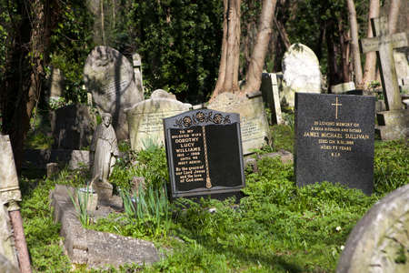 LONDON, ENGLAND - JULY 12, 2016 Tombstone in Hampstead Cemetery, Londonのeditorial素材