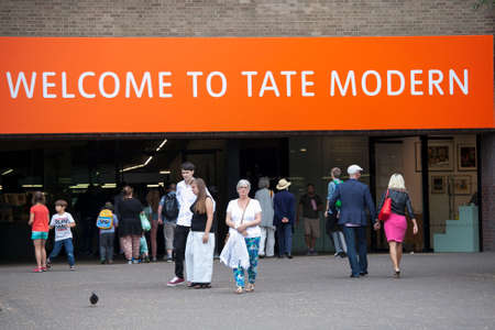 LONDON, ENGLAND - August 11 2017 Entrance to the Tate Modern Museum. Spiritual people leave the museum.のeditorial素材