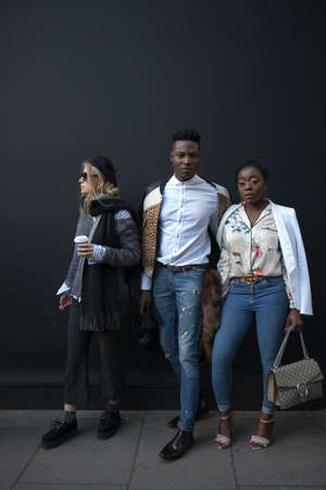 LONDON, ENGLAND - September 15, 2017 Beautiful and stylish woman and man posing during the London Fashion Week.のeditorial素材