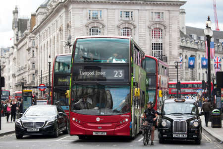 LONDON, ENGLAND - September 11, 2017 Transport stopped at a traffic light near the Piccadilly Circusのeditorial素材