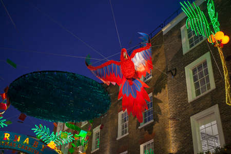LONDON - DECEMBER 18, 2017: Christmas lights on Carnaby Street, London UK. Carnaby Christmas lights feature some of the most unusual decorations and lights in London.のeditorial素材