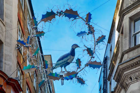 LONDON, ENGLAND - December 18 , 2017 View looking up at the Christmas lights in Slingsby Place off Long Acre in Londonのeditorial素材