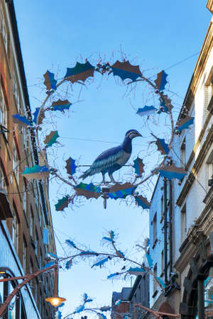 LONDON, ENGLAND - December 18 , 2017 View looking up at the Christmas lights in Slingsby Place off Long Acre in Londonのeditorial素材