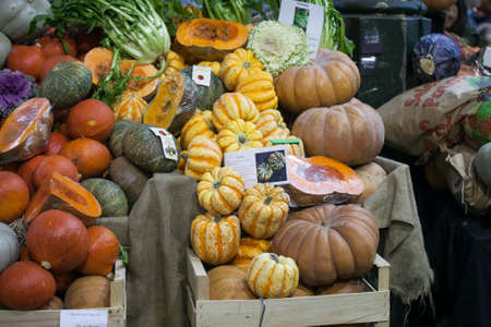 LONDON, ENGLAND - December 18 , 2017 Different types of vegetables on the Borough market in Londonのeditorial素材