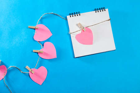 Valentines day. The hearts hanging on ropeの写真素材