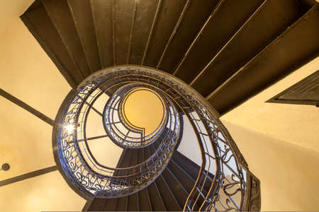 Spiral staircase in the old houseの写真素材