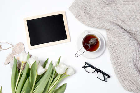 Tulip with blank picture frame on white backgroundの写真素材