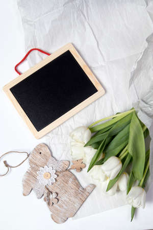 the Tulips with black board, tea on white backgroundの写真素材