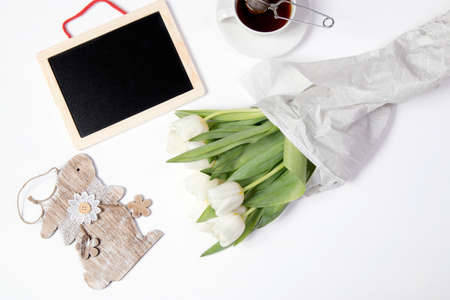 the Tulips with black board, tea on white backgroundの写真素材