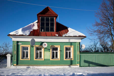 KOLOMNA, RUSSIA - 10 March 2018 Facade of a wooden house. Decorative wood carving. Russian folk styleのeditorial素材