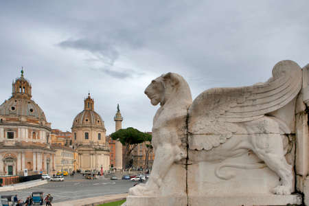 Rome, Italy - November 18, 2017 Piazza Venezia - View of Santa Maria di Loreto Church, Palazzo Valentini and Trajan Column from steps of Altare della Patriaのeditorial素材