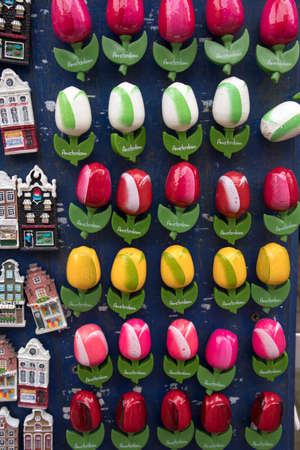 Amsterdam, Holland - 14 April 20018 Souvenirs at Bloemenmarkt -floating flower market- on Singel Canal. Amsterdam. Netherlandsのeditorial素材