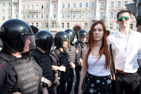 Moscow, RUSSIA - MAY 5, 2018: Police officers in riot gear at Pushkin Square during an opposition...
