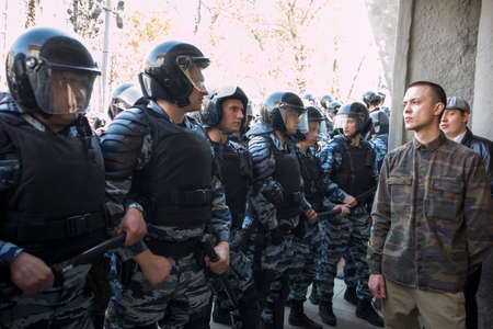 Moscow, RUSSIA - MAY 5, 2018: Police officers in riot gear at Pushkin Square during an opposition...