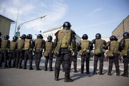 Moscow, RUSSIA - MAY 5, 2018: Police officers in riot gear at Pushkin Square during an opposition...