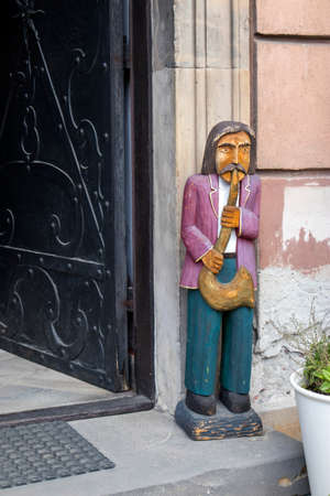 WARSAW, POLAND - June 28, 2018: Wooden figures of musicians at the souvenir shopのeditorial素材