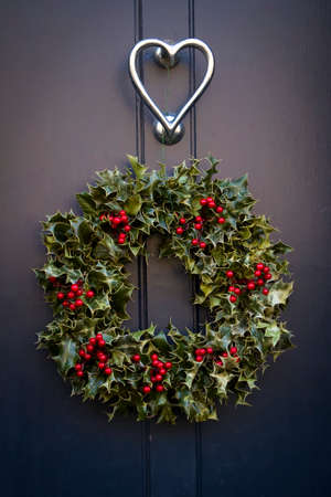 The Wreath decoration at black door for Christmas holidayのeditorial素材