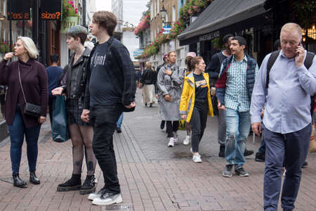 LONDON, ENGLAND - August 11 2018 people go shopping at the Carnaby streetのeditorial素材