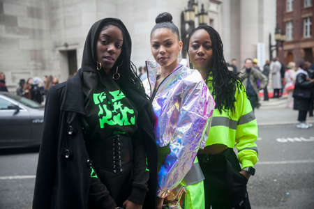 LONDON - FEBRUARY 15, 2019: Stylish attendees gathering outside 180 The Strand for London Fashion...