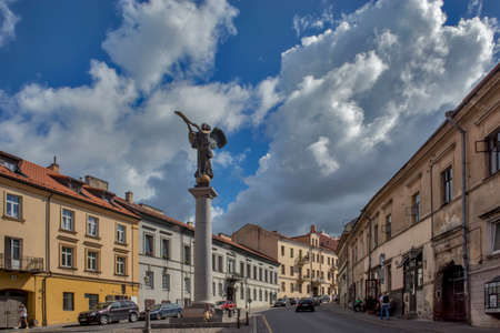 VILNIUS, LITHUANIA - April 19, 2019: Sculpture of Angel blowing a trumpet has been established by the sculptor of Romas Vilciauskas on April 1, 2002. It is a symbol of the Republic of Uzupisのeditorial素材
