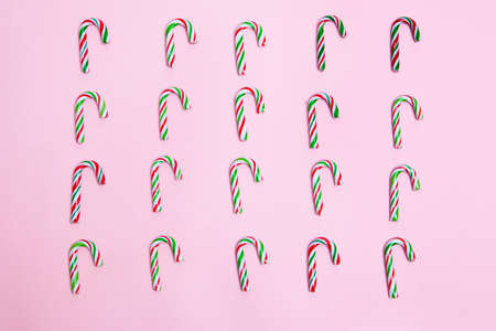 The christmas candies on pink background. Copy space and Minimal composition.の写真素材