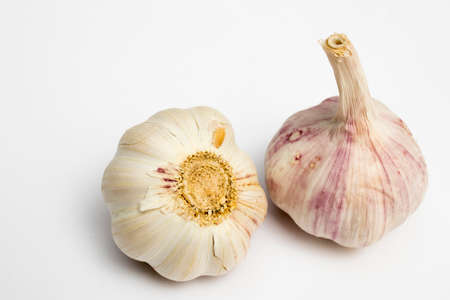 Garlic isolated on plain white background. Close-Up View of Raw Garlic Segments on White Background