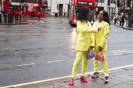 LONDON, UK- febryary 15 2020: Fashionable people on the street . Street style