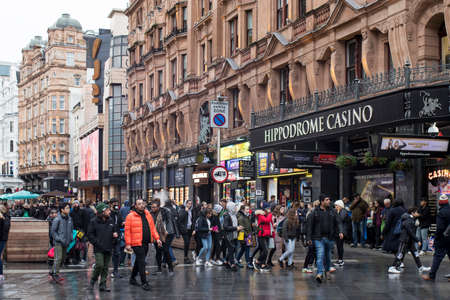 LONDON, UK - March 20, 2020: A crowd of people at Piccadilly Circus. Casino.のeditorial素材