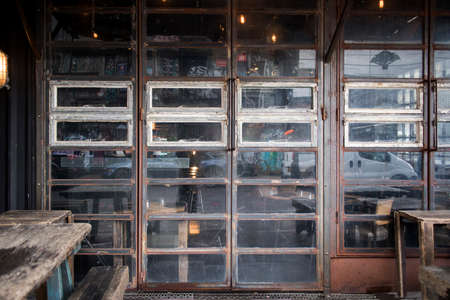 LONDON, UK - March 20, 2020: Hipster cafe, with windows on the floor, similar to a former factory...