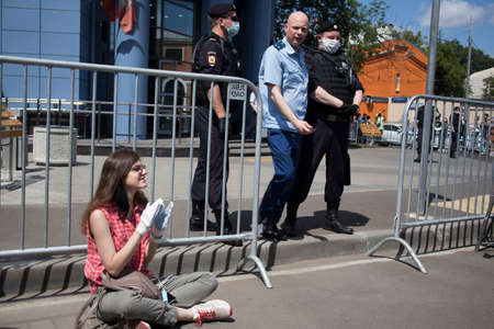 Moscow, Russia - 26.06.2020, People gathered outside court behind police barriers Friday morning....