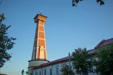 Rybinsk, Russia - August, 10, 2020: Old fire tower (monument of history and architecture of 19th century). Rybinsk, Yaroslavl Oblast, Russia.のeditorial素材