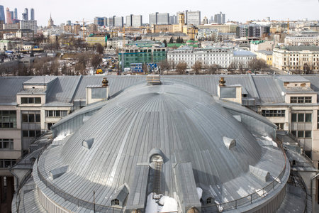 Moscow, Russia - 20 March 2021, View of the Variety Theater and the center of Moscow from the roof of a house on the embankment. The House on the Embankment (Moskovsky Gosudarstvenny teatr Estrady)のeditorial素材