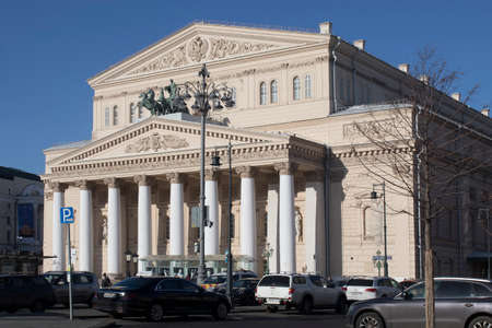 Moscow, Russia - 29 April, 2021, The building of the Bolshoi Theater with the famous team of horses on the facade against the background of the spring blue sky.のeditorial素材