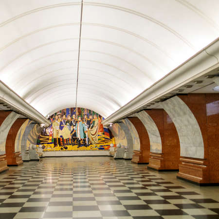 Moscow, Russia - 10 July 2021, new metro station Park Pobedy in the West of the city. Bright clean lobby, orange and white color combinationのeditorial素材