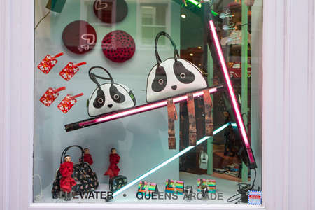 London, UK - November 2019, Shop window with funny bags with Japanese style eyes and various...