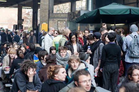 London, UK - September 2019, Busy time on Sunday at the brick lane market near cafe 1001. Men and...