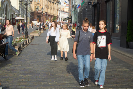 Moscow, Russia - 31 August, 2021, People walk along the pedestrian Kuznetsky Most street, which has many fashion boutiques, on a sunny dayのeditorial素材
