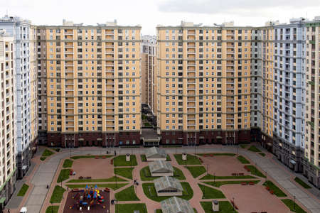 SAINT-PETERSBURG, RUSSIA - Sep 07, 2020: Modern luxury residential complex on the outskirts of a large city at outcast autumn day. Super wide lens perspective.のeditorial素材