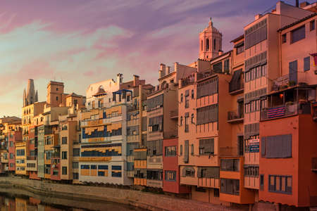 GIRONA, CATALONIA , SPAIN - JUNE 15, 2019: historical jewish quarter in Girona with Eiffel Bridge at sunrise, Barcelona, Spain, Cataloniaのeditorial素材